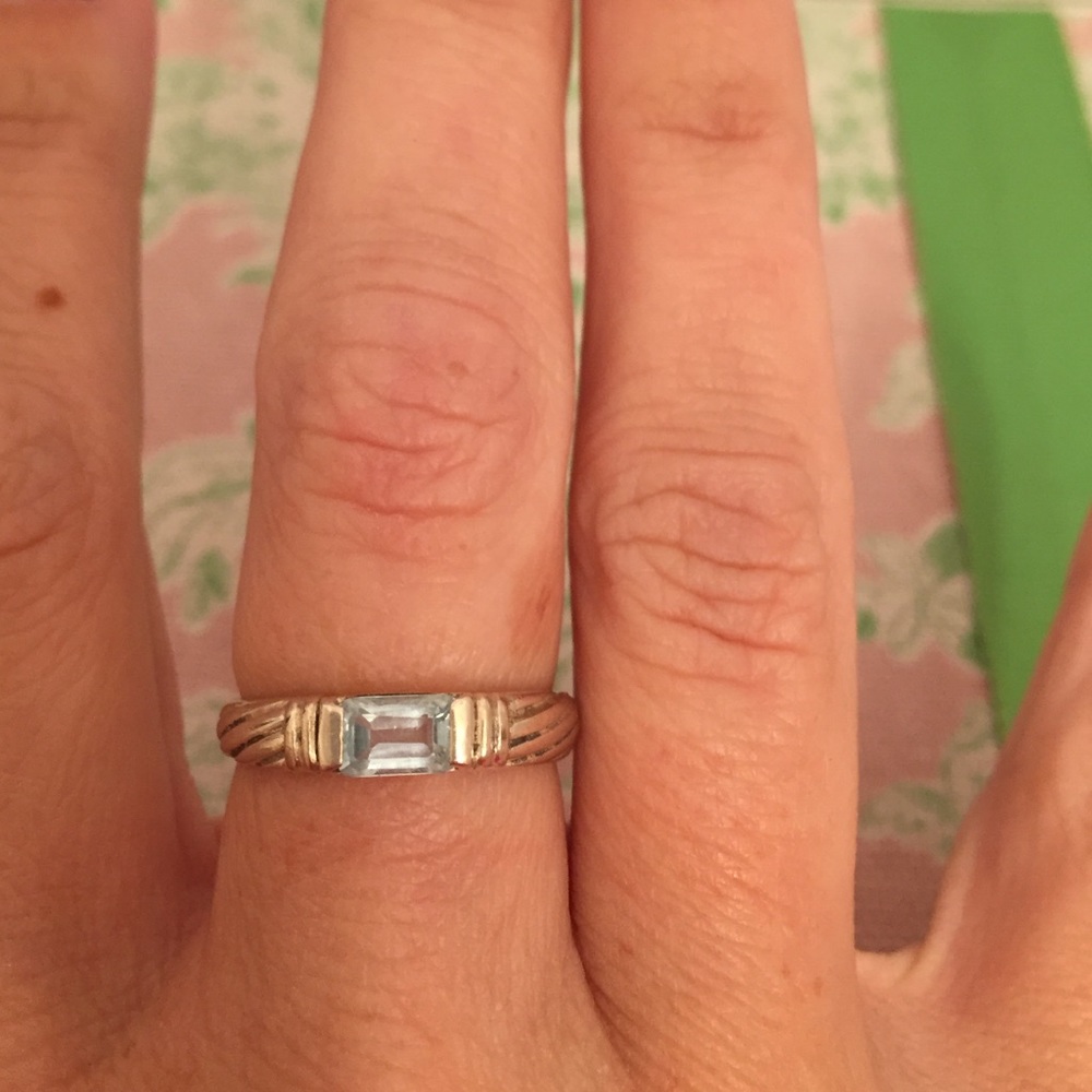 Sterling silver ring with light blue stone